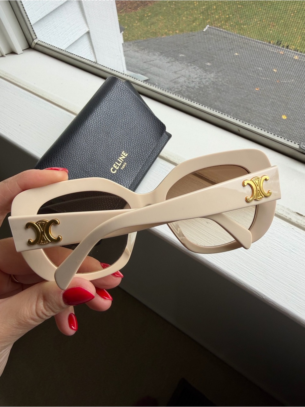 Celine ecru Triomphe sunglasses with gold logo